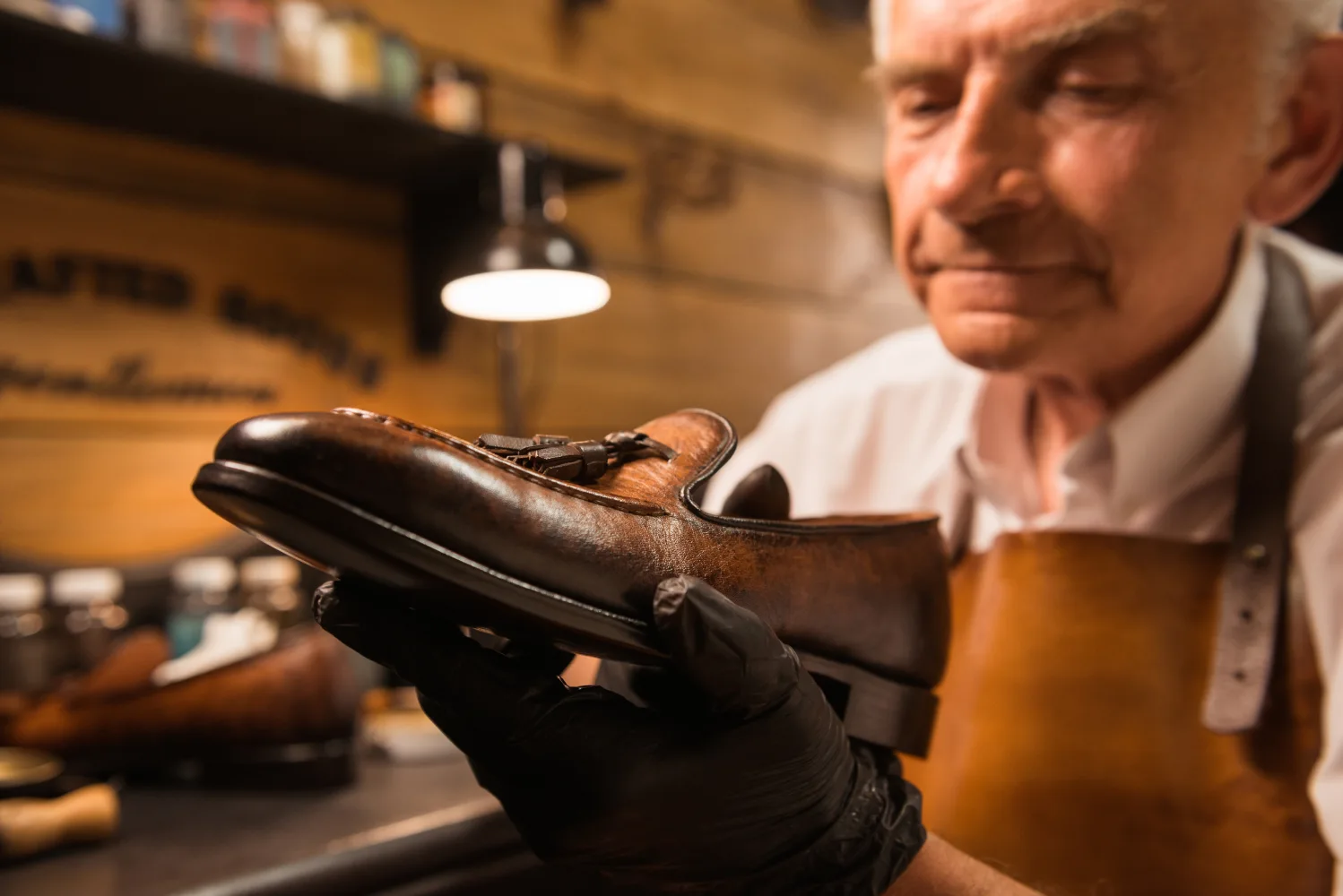 concentrated-shoemaker-workshop-making-shoes (1)