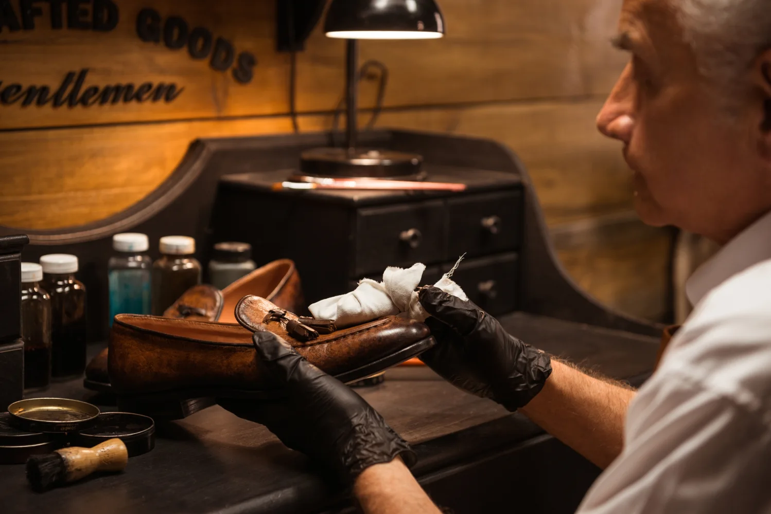 mature-shoemaker-workshop-making-shoes